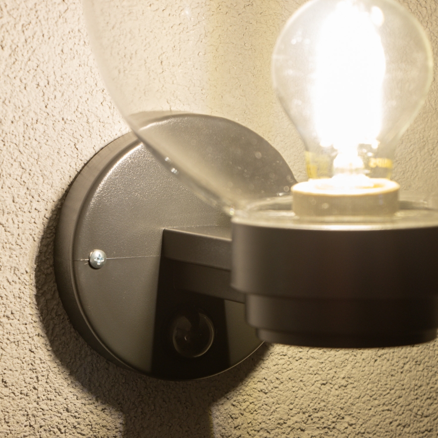 BRILAGI - Udendørs væglampe med bevægelsessensor HARBOR 1xE27/40W/230V IP33 sort/klar