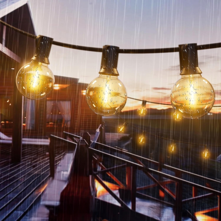 LED dæmpbar udendørs dekorativ lyskæde 25xE12/1W/24/230V 17,5 m IP65 sort + fjernbetjening