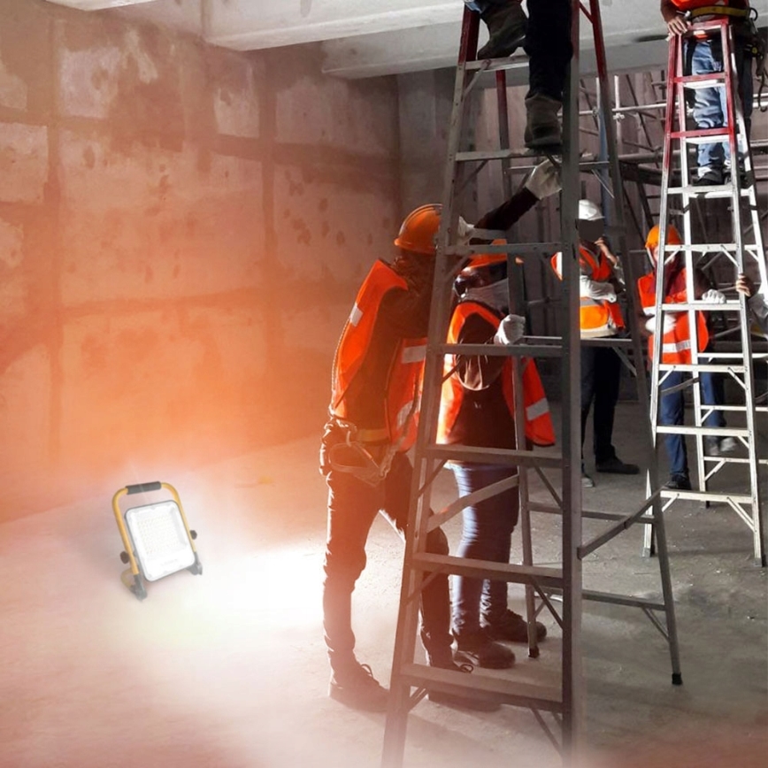 Genopladelig LED-projektør med stativ LED/100W/3,2V 5000K 5000 mAh IP65 orange
