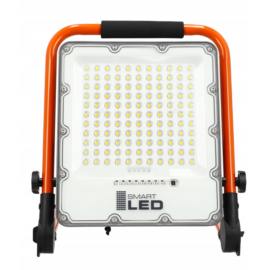 Genopladelig LED-projektør med stativ LED/100W/3,2V 5000K 5000 mAh IP65 orange