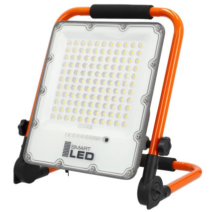 Genopladelig LED-projektør med stativ LED/100W/3,2V 5000K 5000 mAh IP65 orange
