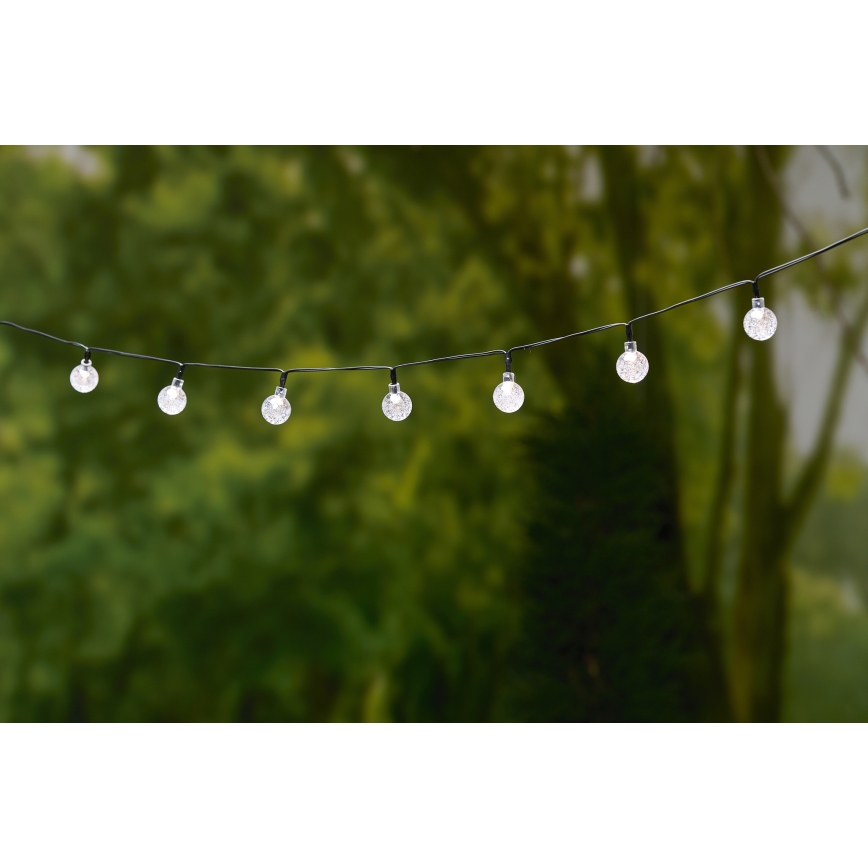 Grundig - Soldrevet LED lyskæde 50xLED/8 funktioner 6,9 m varm hvid