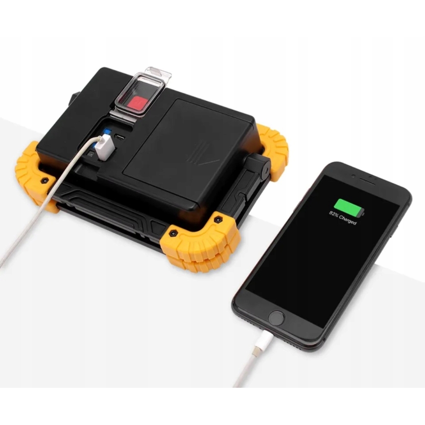 LED genopladelig projektør med indbygget powerbank LED/20W/5V 4400 mAh IP44 sort/gul