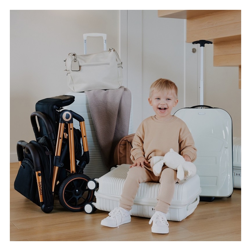 Lionelo - Barnevogn CLOE sort/guldfarvet