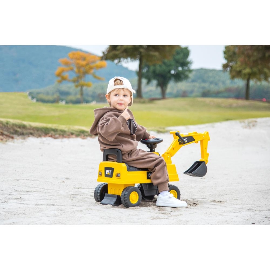 Løbecykel gravemaskine CAT 2xAA gul/sort