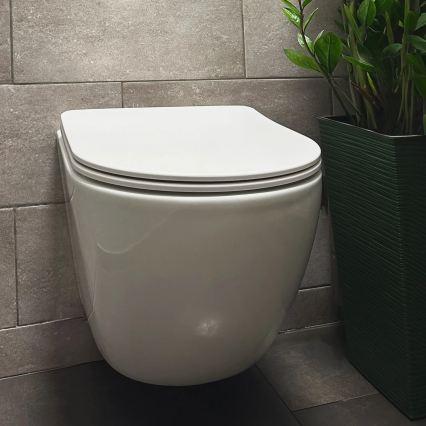 REA-C1259 - Væghængt WC med toiletsæde CARLO MINI TORNADO RIMLESS keramik/højglans hvid