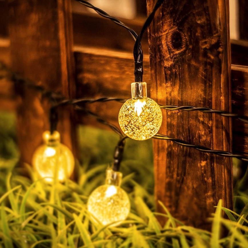 Solcelledrevet LED-dekorationskæde 50 LED / 8 funktioner 500 mAh 9,5 m IP67 varm hvid