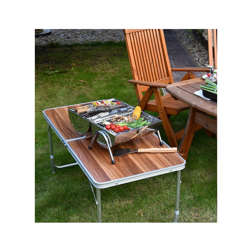 Transportabel kulgrill skinnende krom