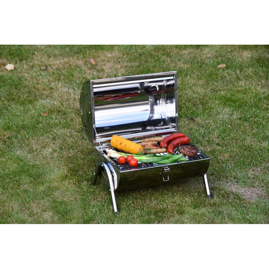 Transportabel kulgrill skinnende krom