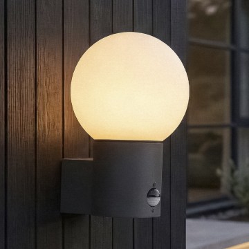 Udendørs væglampe med bevægelses- og skumringssensor STONO 1xE27/15W/230V IP65 antracit